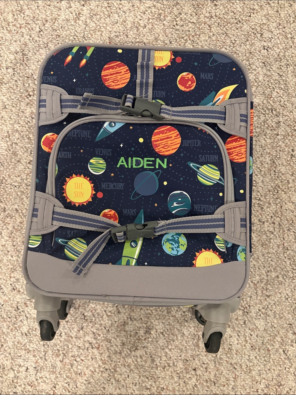 Pottery Barn Kids small suitcase.  Aiden is monogramed.